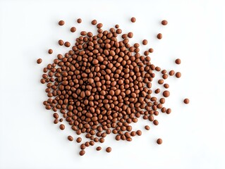 pile of brown grains, high-angle view, clean white background