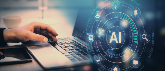 AI technology concept with hand on laptop, digital interface with AI symbol and icons on blue background.