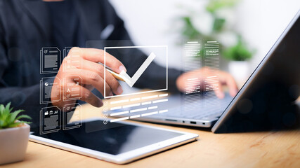 Businessman showing online document validation icon, quality assessment management With a...