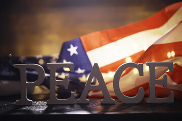 Peace Word Written In Wooden Letters. International conflict, American hegemony, War. Ukraine and...