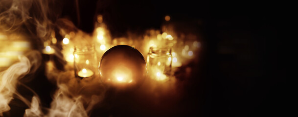 Abstract background with smoke ball and candles. Prediction of the future. Divination.