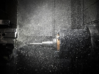 CNC machine drilling with coolant