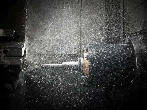 CNC machine drilling with coolant