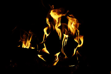 Fototapeta premium Background of the flame in the oven. Overlay layer. Tongues of fire in a brick fireplace.