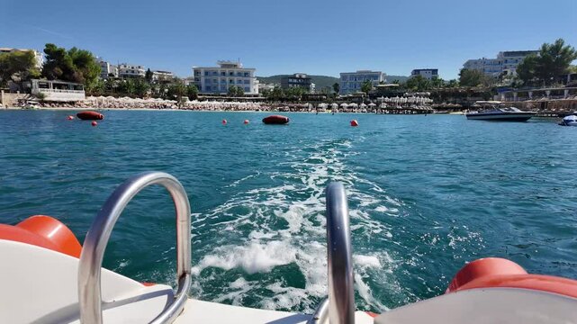 Ksamil Albania holiday watersport hydrobike leaving coastline beach summer