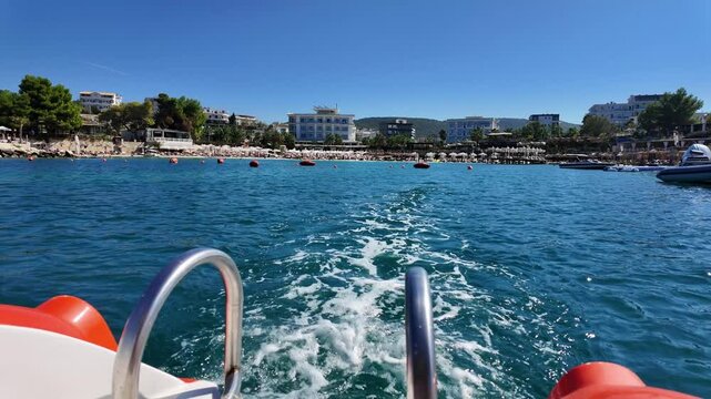 Ksamil Albania holiday watersport hydrobike leaving coastline beach summer