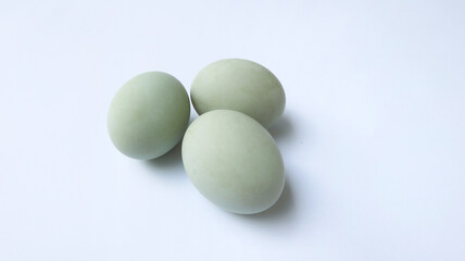 Raw duck eggs isolated on white background. Rich in protein nutrition. copy space