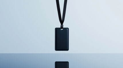 Brit Awards. Black lanyard holding sleek ID tag against reflective surface
