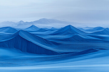 Vibrant blue sand dunes contrast with golden desert landscape under a clear sky