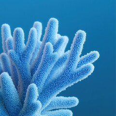 Fototapeta premium Beautiful blue coral thriving in a vibrant underwater ecosystem.