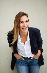 Portrait cheerful woman leaning forward with a genuine smile