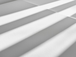 Obraz premium Close-up of smooth printer paper texture, focusing on the even surface and subtle reflections under bright, diffused light. The tone is bright white with minimal imperfections