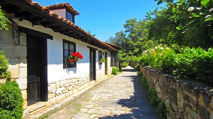 Charming Stone Cottages on Cobblestone Street, Sunny Day