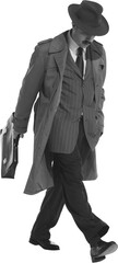 Man in suit, fedora hat and trench coat walks with briefcase, capturing retro aesthetic isolated on transparent background. Concept of retro and vintage, fashion, business. Black and white photography