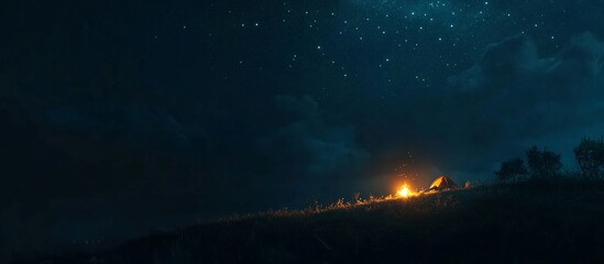 Night camping scene with a bonfire under a starry sky.