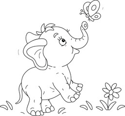 Fototapeta premium Cute baby elephant merrily playing with a cheerful butterfly on a summer lawn