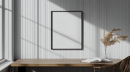 A blank poster frame on the wall of an office
