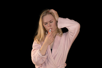 Girl Feeling Sick with Thermometer in Mouth and Headache in Pink Bathrobe