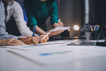 Group of young asian creative business brain storm meeting presentation,discussing roadmap to product launch, planning,strategy,new business development,working with new startup project in office.