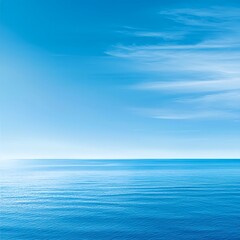 Obraz premium Tranquil Blue Ocean Surface Under Clear Sky with Light Clouds
