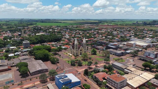 More distanced aerial movement from the famous Paróquia Menino Deus Church, Toledo, Paraná, Brazil.