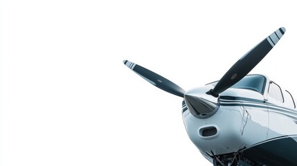 Close-up view of a sleek airplane propeller against a bright white background, showcasing aviation design