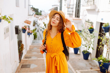Happy woman on vacation in the street’s town on the costa. Europe travel. Lifestyle, vacation,...