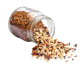 mixed grains and seeds spilling from glass jar isolated background healthy food ingredients organic nutrition concept

