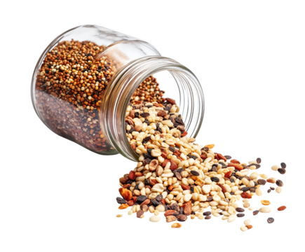 mixed grains and seeds spilling from glass jar isolated background healthy food ingredients organic nutrition concept
