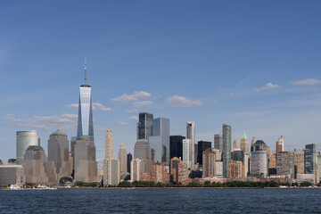 Fototapeta premium New York City Skyline with Manhattan Skyscrapers and Waterfront View in Summer.