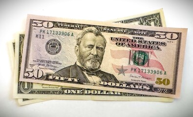 Stack of fifty dollar bills