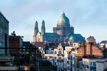 Naklejka premium Basilica of the Sacred Heart and houses, high angle cityscape view over Jette and Koekelberg, Brussels, Belgium