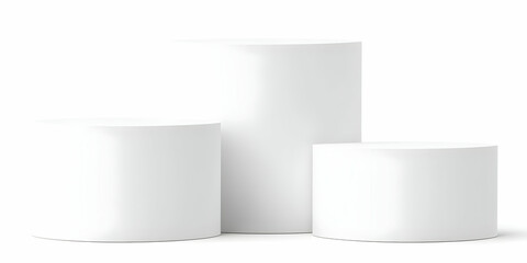 Three White Cylindrical Podiums Stand on a White Background, Perfect for Product Display or Presentation.