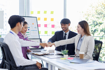 Asian Team work, presentation and meeting with office desk, collaboration and laptop or brainstorming for online project. Employee, working together research on tech for info, coworking and company.