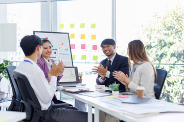 Asian Team work, presentation and meeting with office desk, collaboration and laptop or brainstorming for online project. Employee, working together research on tech for info, coworking and company.