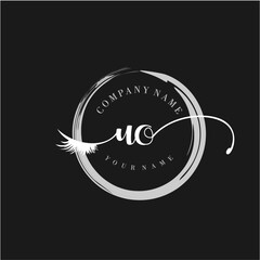 UO Elegant Circular Logo Design with Feather and Calligraphic Text