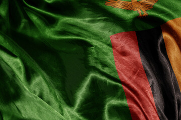 shine waving colourful realistic national flag of zambia . macro shot