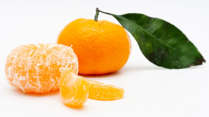 Tangerines. Close view on Fresh Mandarin Orange.  Isolated on White Background. Citrus. Sweet....
