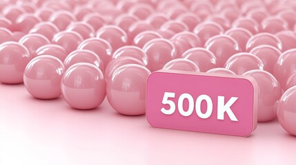 Large Group of Shiny Pink Spheres with a 500k Sign, Suggesting Large Followers or Likes.