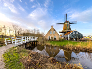 Traditional Dutch wood saw windmill in IJlst at sunrise
