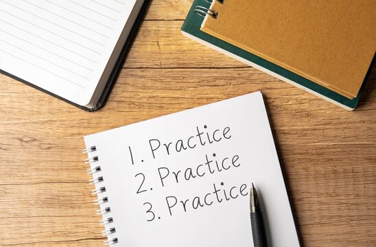 A notebook with the word "Practice" written three times on a wooden table. Self-improvement and consistency concept.