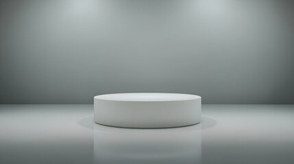 White Cylinder Podium Stands on a Gray Floor with Two Spotlights Shining on it from Above