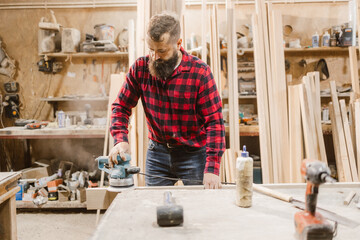 Woodworking Craftsman in Workshop