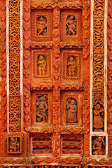 Carvings of Krishna’s Gosthalila on the terracotta Gopinath Temple, Srikrishnapur, Hooghly, West Bengal, India.