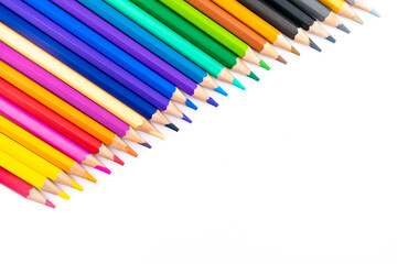 Fototapeta premium Colourful wooden colored pencils isolated on white background with copy space