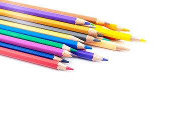 Colourful wooden colored pencils isolated on white background with copy space