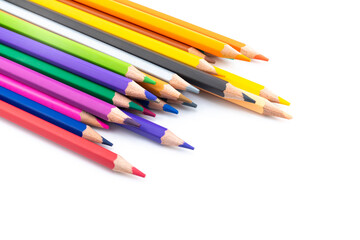 Colourful wooden colored pencils isolated on white background with copy space