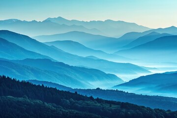 Obraz premium Serene Layers of Blue Mountains Under a Misty Sky