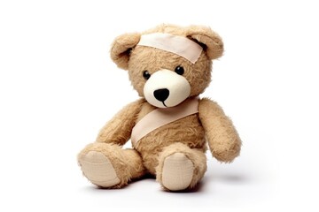 Obraz premium Teddy bear bandage plush toy.
