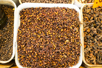 Cloves spice in a bag for sale at the market.